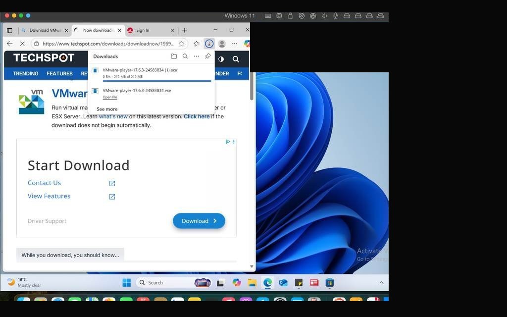VMware page & Windows 11 installation running side by side on macOS